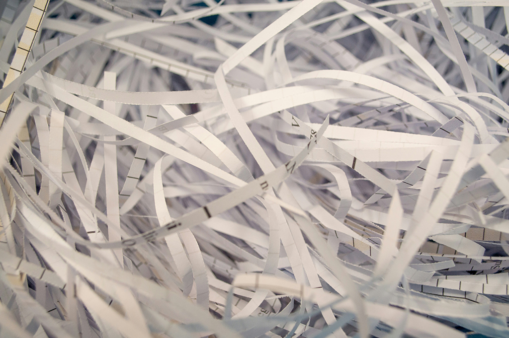 Confidential business paper after secure shredding